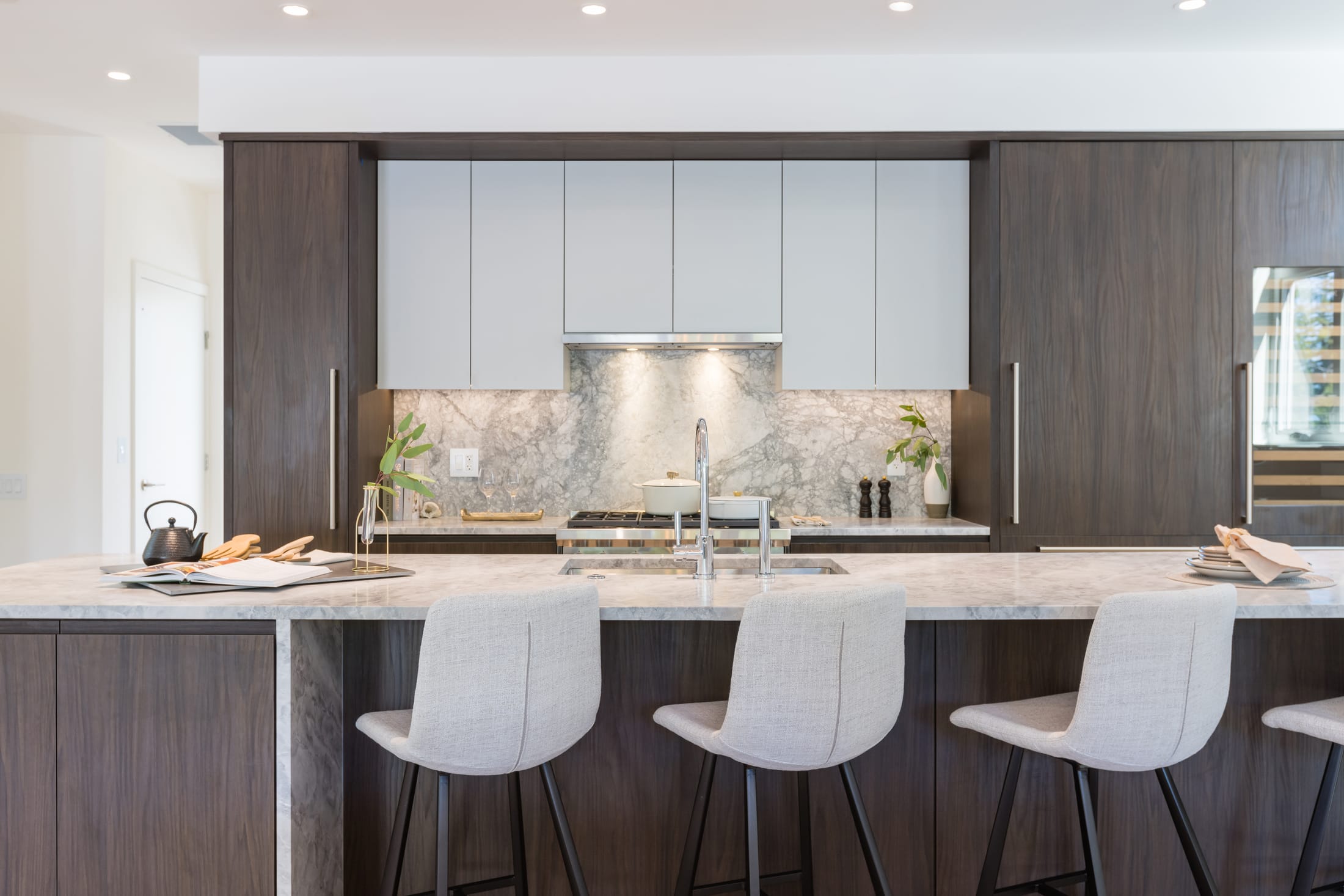 Walnut kitchen with marble island at Evelyn